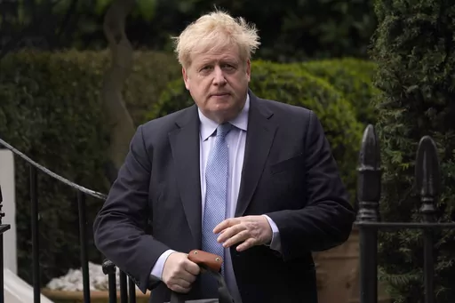 Boris Johnson leaves his house in London, on March 22, 2023. Former Prime Minister Boris Johnson deliberately misled Parliament about the lockdown-flouting parties that undermined his credibility and contributed to his downfall, a committee of lawmakers said Thursday, June 15, 2023 after a year-long investigation. (AP Photo/Alberto Pezzali, File)