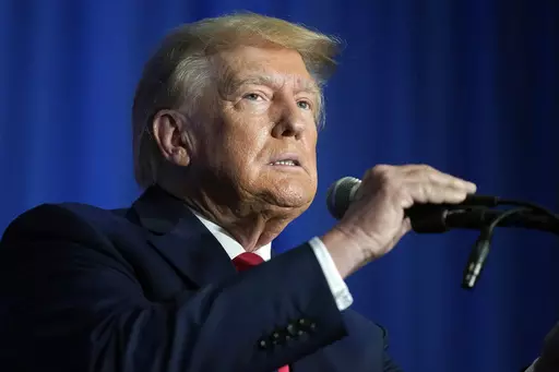 Former President Donald Trump speaks at the New Hampshire Federation of Republican Women Lilac Luncheon, June 27, 2023, in Concord, N.H. The 2024 election will determine whether Trump returns to the White House. It could also decide whether he might face time behind bars. (AP Photo/Steven Senne, File)