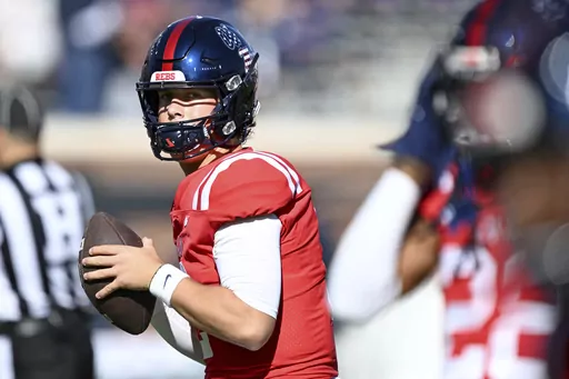 Mississippi quarterback Jaxson Dart (2) warms up before an NCAA college football game against Louisiana Monroe in Oxford, Miss., Saturday, Nov. 18, 2023. The much-anticipated matchup in Saturday’s Peach Bowl is No. 10 Penn State’s top-ranked defense against No. 11 Mississippi’s up-tempo offense. (AP Photo/Thomas Graning, File)