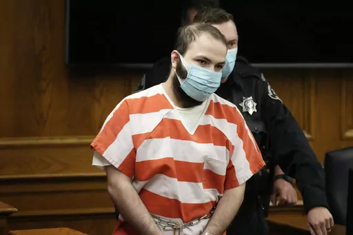 Ahmad Al Aliwi Alissa is led into a courtroom for a hearing, Sept. 7, 2021, in Boulder, Colo. Prosecutors said Wednesday, Aug. 23, 2023, that Alissa, accused of killing 10 people at a Boulder supermarket in 2021, is competent for trial. (AP Photo/David Zalubowski, Pool, File)
