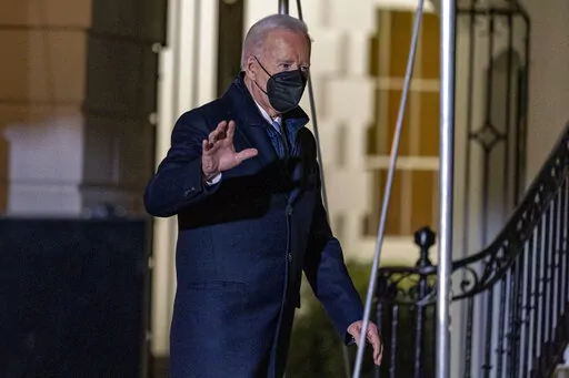 President Joe Biden walks towards Marine One on the South Lawn of the White House in Washington, Friday, Jan. 14, 2022, to travel to Wilmington, Del. (AP Photo/Andrew Harnik)