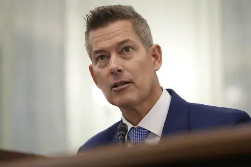 Former Wisconsin Rep. Sean Duffy, R-Wis., testifies before the Senate Commerce, Science, and Transportation Committee on Capitol Hill in Washington, Wednesday, Jan. 15, 2025, for his nomination to be Transportation Secretary. (AP Photo/Susan Walsh)