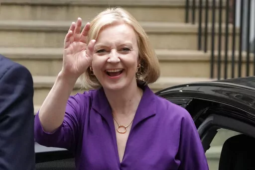 Liz Truss arrives at Conservative Central Office in Westminster after winning the Conservative Party leadership contest in London, Monday, Sept. 5, 2022. Liz Truss will become Britain's new Prime Minister after an audience with Britain's Queen Elizabeth II on Tuesday Sept. 6. (AP Photo/Kirsty Wigglesworth)