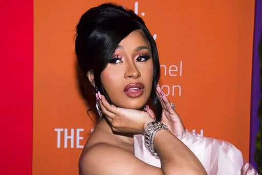 Cardi B appears at the 5th annual Diamond Ball benefit gala at Cipriani Wall Street in New York on Sept. 12, 2019. The Grammy-winning rapper resolved a yearslong criminal case stemming from a pair of brawls at New York City strip clubs by pleading guilty Thursday in a deal that requires her to perform 15 days of community service.  (Photo by Mark Von Holden/Invision/AP, File)