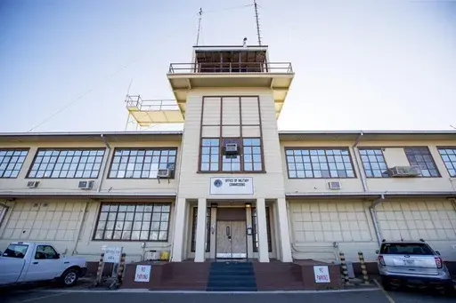 In this photo reviewed by U.S. military officials, the Office of Military Commissions building used for Periodic Review Board hearings stands, on April 18, 2019, in Guantanamo Bay Naval Base, Cuba. (AP Photo/Alex Brandon, File)