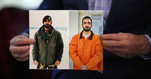 Sami-ullah Safi holds photographs of his brother, Abdul Wasi Safi, as he talks about his brother's journey to the U.S. during an interview Wednesday, Jan. 18, 2023, in Houston. Safi's brother, who's called Wasi by his family, was an intelligence officer with the Afghan National Security Forces, providing U.S. armed forces with information for operations against terrorists, said Sami-ullah Safi. Wasi was arrested after crossing the U.S.-Mexico border near Eagle Pass, Texas in September 2022, and 