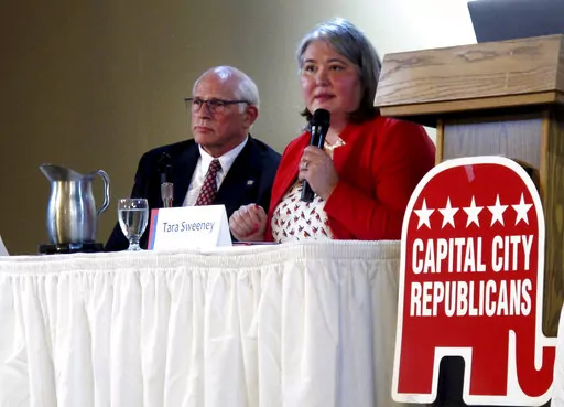 Republican Tara Sweeney, right, speaks Monday, May 16, 2022, at a forum in Juneau, Alaska, that was also attended by three other Republican candidates for Alaska's U.S. House seat, including John Coghill, left. Sweeney and Coghill are among 48 candidates in a June 11 special primary for the House seat left vacant by the death earlier this year of Republican Rep. Don Young. (AP Photo/Becky Bohrer)