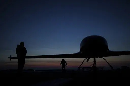 Ukrainian servicemen of the Defence Intelligence prepare to launch long-range drones An-196 Liutyi in undisclosed location, Ukraine, Feb. 28, 2025. (AP Photo/Evgeniy Maloletka)