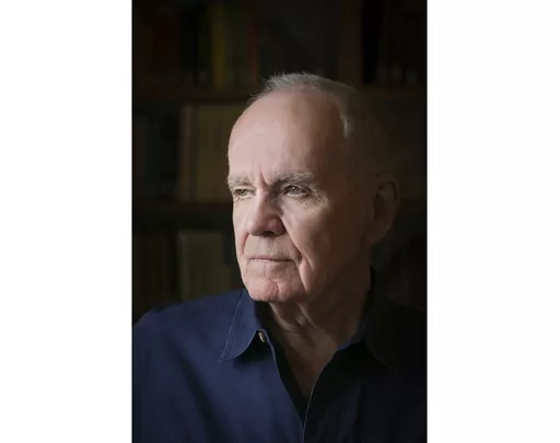 Author Cormac McCarthy poses for a portrait in Santa Fe, N.M., on Aug. 12, 2014. McCarthy, the Pulitzer Prize-winning novelist who in prose both dense and brittle took readers from the southern Appalachians to the desert Southwest in such novels as “The Road,” “Blood Meridian” and “All the Pretty Horses,” died Tuesday. He was 89. (Beowulf Sheehan via AP)