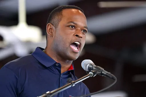 Kentucky Attorney General Daniel Cameron addresses the audience gathered during the Fancy Farm Picnic at St. Jerome Catholic Church in Fancy Farm, Ky., Saturday, Aug. 6, 2022. Cameron is a candidate in the Republican primary for Kentucky Governor. (AP Photo/Timothy D. Easley)