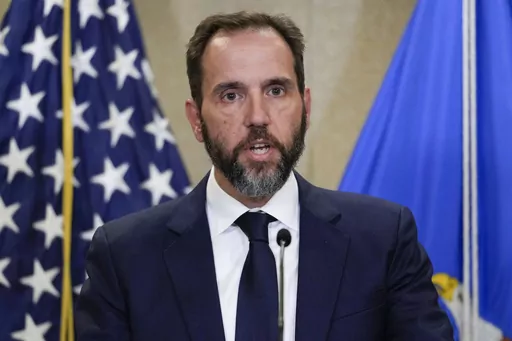 Special counsel Jack Smith speaks to the media about an indictment of former President Donald Trump, Aug. 1, 2023, at an office of the Department of Justice in Washington. A slim majority of Americans approve of the U.S. Justice Department indicting Donald Trump over his efforts to remain in office after losing the 2020 election, according to a new poll from The Associated Press-NORC Center for Public Affairs Research. (AP Photo/J. Scott Applewhite, File)