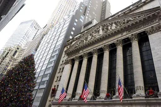 The New York Stock Exchange, Wednesday, Dec. 14, 2022, in New York. The Federal Reserve raised interest rates by half a point on Wednesday. Stocks are off to a weak start on Wall Street as worries grow that the Federal Reserve and other central banks are willing to bring on a recession if that’s what it takes to get inflation under control. (AP Photo/Julia Nikhinson)