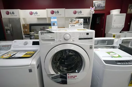 Washing machines are displayed at Sam's Appliances TV & Furniture, on March 25, 2021, in Norwood, Mass. On Thursday, the Labor Department reports on U.S. consumer prices for July. Economists expect the report to show prices rose 3.3%. (AP Photo/Steven Senne, File)
