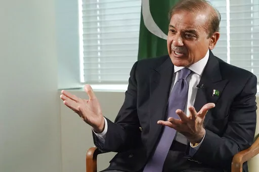 Prime Minister of Pakistan Shehbaz Sharif speaks during an interview with The Associated Press, Thursday, Sept. 22, 2022 at United Nations headquarters. Sharif said he came to the United Nations to tell the world that his country is the victim of unprecedented climate change-induced flooding that has submerged one-third of its territory and left 33 million people scrambling to survive, and to warn that “tomorrow this tragedy can fall on some other country.” (AP Photo/Mary Altaffer)