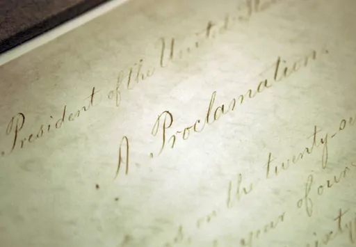The original Emancipation Proclamation is shown on display in the Rotunda of the National Archives in Washington, Feb. 18, 2005. The tradition of Watch Night services in the United States dates back to Dec. 31, 1862, when many Black Americans gathered in churches and other venues, waiting for President Abraham Lincoln to sign the Emancipation Proclamation into law. It's still being observed each New Year's Eve, at many multiracial and predominantly Black churches across the country. (AP Photo/Ev