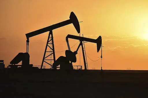 Pump jacks extract oil from beneath the ground in North Dakota, May 19, 2021. The federal government announced a $241.5 million settlement with Marathon Oil on Thursday, July 11, 2024, for alleged air quality violations at the company's oil and gas operations in the Forth Berthold Indian Reservation in North Dakota. (AP Photo/Matthew Brown, File)