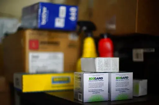 Auto parts are displayed on a shelf at a car repair shop, Wednesday, July 13, 2022, in Collingdale, Pa. On Wednesday, the Labor Department releases the Producer Price Index for December. (AP Photo/Matt Slocum, File)