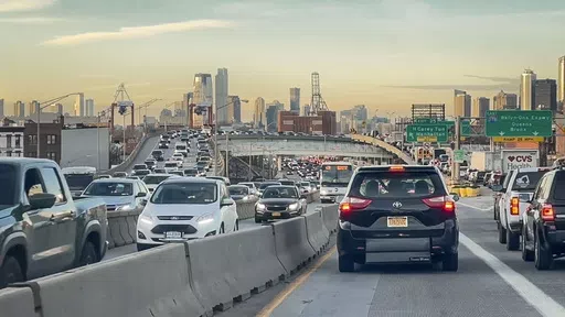 Traffic is steady as vehicles approach Hugh Carey tunnel linking Brooklyn to Manhattan, Wednesday, Feb. 7, 2024, in New York. New York’s first-in-the-nation plan to levy a hefty toll on drivers entering much of traffic-choked Manhattan is the focus of a legal battle set to play out in federal court Friday, May 17. (AP Photo/Bebeto Matthews, File)