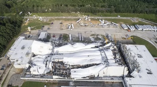 Debris is scattered around the Pfizer facility on Wednesday, July 19, 2023, in Rocky Mount, N.C., after damage from severe weather. On Friday, July 21, The Associated Press reported on stories circulating online incorrectly claiming the plant damaged by a tornado was stocked with the company’s COVID-19 vaccine. (Travis Long/The News & Observer via AP, File)