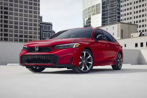 This photo provided by Honda shows the fun-to-drive 2025 Honda Civic sedan, which offers excellent fuel economy with its hybrid powertrain. (Courtesy of American Honda Motor Co. via AP)