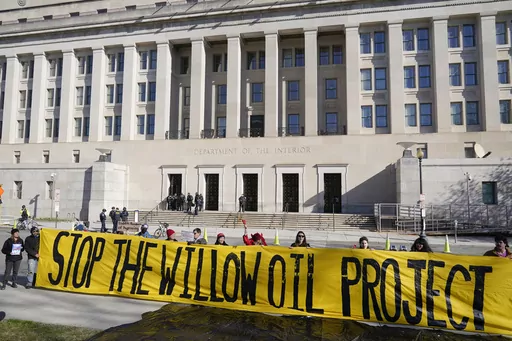 Demonstrators protest against the Biden administration's approval of the Willow oil-drilling project before a scheduled speech by Biden at the Department of the Interior in Washington, March 21, 2023. A federal judge on Thursday, Nov. 9 upheld the Biden administration's approval of the Willow oil-drilling project on Alaska's remote North Slope, a massive project that had drawn the ire of environmentalists who accused the president of backpedaling on his pledge to combat climate change. (AP Photo