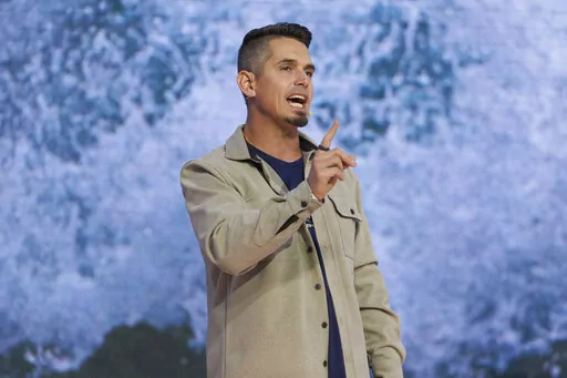 Pastor Andy Wood gives a sermon on Sunday, Oct. 16, 2022, at Saddleback Church in Lake Forest, Calif. Wood was recently announced as founding Pastor Rick Warren's successor to the church, which is the second largest in the Southern Baptist Convention, regularly drawing in about 2,500 people with more online every Sunday. (AP Photo/Allison Dinner)