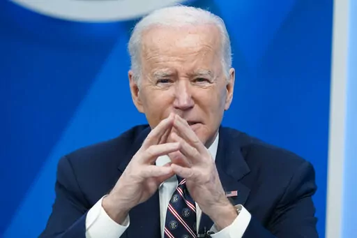 President Joe Biden speaks in the South Court Auditorium in the Eisenhower Executive Office Building on the White House complex, Tuesday, Feb. 22, 2022, in Washington. (AP Photo/Alex Brandon)
