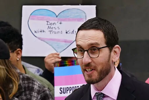 State Sen. Scott Wiener, D-San Francisco, discusses his proposed measure to provide legal refuge to displaced transgender youth and their families during a news conference in Sacramento, Calif., March 17, 2022. Democratic lawmakers in more than a dozen states are following California’s lead in seeking to offer legal refuge to displaced transgender youth and their families. The coordinated effort being announced Tuesday, May 3, by the LGBTQ Victory Institute and other advocates comes in respons