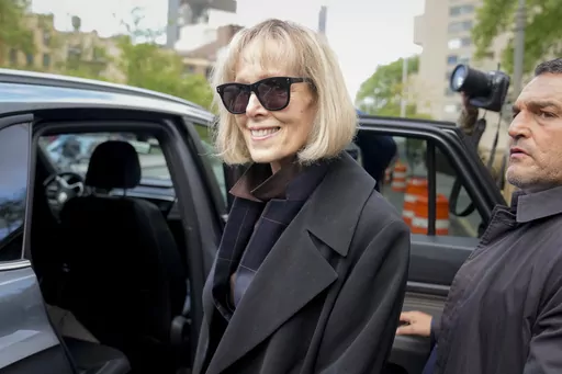 FILE Former advice columnist E. Jean Carroll, left, leaves Manhattan federal court, Thursday, May 4, 2023, in New York. (AP Photo/John Minchillo)