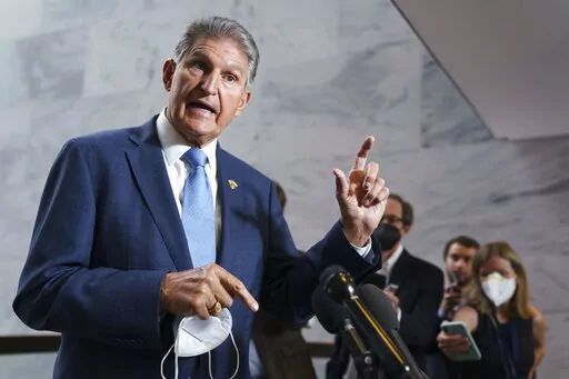Sen. Joe Manchin, D-W.Va., talks with reporters as the Capitol in Washington, Aug. 1, 2022. Sen. Susan Collins, R-Maine, and Manchin are making the case for overhauling the 1800s-era Electoral Count Act. The two senators pushed Aug. 3, for quick passage of their bipartisan compromise that would make it harder for a losing candidate to overturn the legitimate results of a presidential election.(AP Photo/J. Scott Applewhite, File)