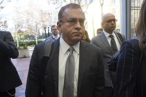 Ramesh "Sunny" Balwani, the former lover and business partner of Theranos CEO Elizabeth Holmes, arrives at federal court in San Jose, Calif., on Dec. 7, 2022. On Thursday, March 9, 2023, a federal judge rejected Balwani’s bid to remain free while he appeals his conviction for crimes he committed during a blood-testing scam that he orchestrated with Elizabeth Holmes. (AP Photo/Jeff Chiu, File)
