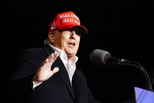 Former President Donald Trump speaks at a rally, Saturday, Jan. 15, 2022, in Florence, Ariz. (AP Photo/Ross D. Franklin)