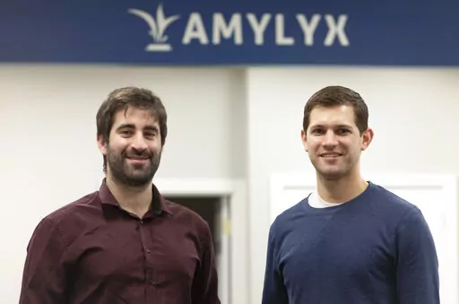 This 2018 photo provided by Amylyx shows the company's co-founders Joshua Cohen, left, and Justin Klee in Cambridge, Mass. on Sept. 2, 2022. A closely watched experimental drug for Lou Gehrig’s disease is getting an unusual second look from U.S. regulators on Wednesday, Sept. 7, 2022, amid intense pressure to approve the treatment for patients with the fatal illness. Patients and their families have rallied behind the drug from Amylyx Pharma, launching an aggressive lobbying campaign and enlis