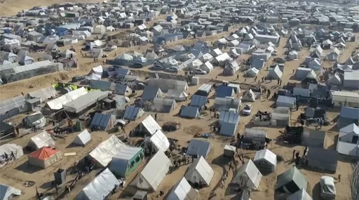 This drone image shows thousands of tents used by displaced people in Rafah, southern Gaza Strip on Friday, Dec. 29, 2023. The United Nations says tens of thousands of Palestinians streamed into the already crowded town at the southernmost end of Gaza in recent days. They are fleeing Israel’s bombardment of the center of the strip. (AP Photo)