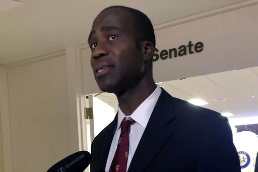 Dr. Joseph Ladapo speaks with reporters after the Florida Senate confirmed his appointment as the state's surgeon general on Feb. 23, 2022, in Tallahassee, Fla. An analysis that was the basis of a highly criticized recommendation from Florida’s surgeon general cautioning young men against getting the COVID-19 vaccine omitted information that showed catching the virus could increase the risk of a cardiac-related death much more than getting the shot. That's according to drafts of the analysis o