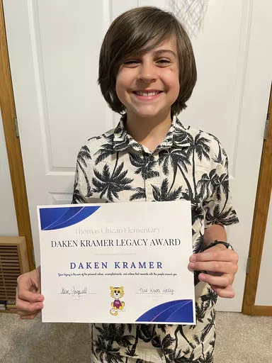 Missouri fifth grade student Daken Kramer, 11, holds an award at Blue Springs High School in Blue Springs, Kansas. Kramer was concerned about children who owed money for meals at his school. So the enterprising fifth-grader decided to do something about it. Daken posted a video challenging friends, family, even strangers and businesses to pay off the meal debt at the school. The 11-year-old was apparently pretty convincing: He raised more than double the original $3,500 goal — all told, $7,370