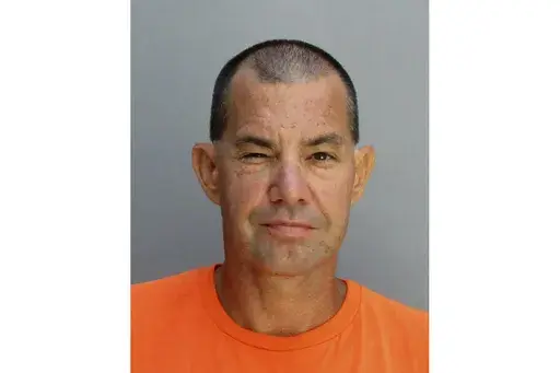 This undated booking photo provided by the Arizona Department of Corrections, Rehabilitation and Reentry shows Aaron Brian Gunches, who was convicted of murder in the 2002 killing of Ted Price in Maricopa County, Ariz. (Arizona Department of Corrections, Rehabilitation and Reentry via AP, File)