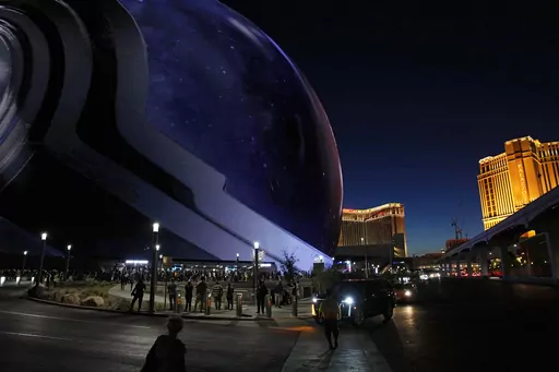 People arrive during the opening night of the Sphere, Friday, Sept. 29, 2023, in Las Vegas. (AP Photo/John Locher)