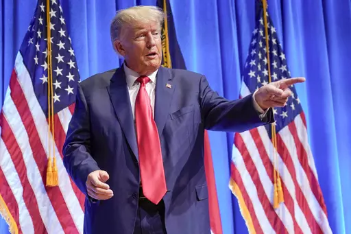 Former President Donald Trump gestures after speaking during the North Carolina Republican Party Convention in Greensboro, N.C., Saturday, June 10, 2023. Now seeking a second term even as he fights federal charges, Trump continues to shatter the norms of American politics. While the country has endured liars in the White House before, no president has ever scorned the truth as regularly as Trump, who continues to lie about his loss to Joe Biden in the 2020 election. (AP Photo/Chuck Burton)