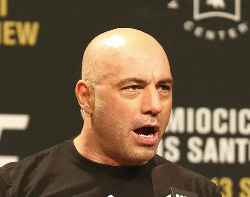 Joe Rogan is seen during a weigh-in before UFC 211 on Friday, May 12, 2017, in Dallas before UFC 211.  Spotify’s popular U.S. podcaster has apologized after a video compilation surfaced that showed him using racial slurs in clips of episodes over a 12-year span. In a video posted on his Instagram account on Saturday, Feb. 5, 2022, Rogan who hosts a podcast called “The Joe Rogan Experience,” said his use of the slurs was the “most regretful and shameful thing that I’ve ever had to talk 