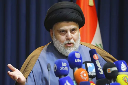 Populist Shiite cleric Muqtada al-Sadr, speaks during a mews conference in Najaf, Iraq, Thursday, Nov. 18, 2021. On Sunday, June 12, 2022, 73 lawmakers from the powerful cleric’s bloc submitted their resignation based on his request, to protest a persisting political deadlock eight months after general elections were held. (AP Photo/Anmar Khalil, File)