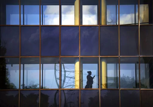 A woman walks inside a hallway on Monday, Aug. 6, 2018, at Commonwealth Health Moses Taylor Hospital in Scranton, Pa.  There are several things that can prevent you from getting therapy or other mental health treatment. A social stigma against needing that kind of help is a big one, as is the inability to take time out of the workday for appointments. But for many, the biggest blocker of all is the cost. You might not find a lot of therapists in your area that take your insurance, and even if yo
