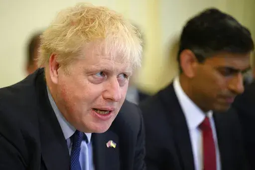 Britain's Prime Minister Boris Johnson addresses his Cabinet during his weekly Cabinet meeting in Downing Street on Tuesday, June 7, 2022 in London. Conservative lawmakers voted by 211 to 148 to back Johnson as leader, but the scale of the revolt was considered more damaging than expected.  If Johnson's opponents manage to push him out, or if he resigns, the party would hold a leadership contest to choose his replacement. (Leon Neal/Pool Photo via AP, FIle)