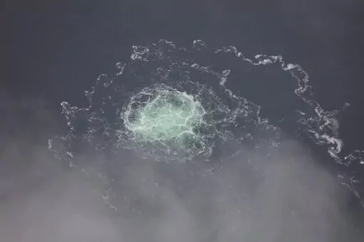 In this picture provided by Swedish Coast Guard, a leak from Nord Stream 2 is seen, on Sept. 28, 2022. Germany’s defense minister voiced caution Wednesday March 8, 2023 over media reports that a pro-Ukraine group was involved in blowing up the Nord Stream gas pipelines in the Baltic Sea last year. (Swedish Coast Guard via AP, File)