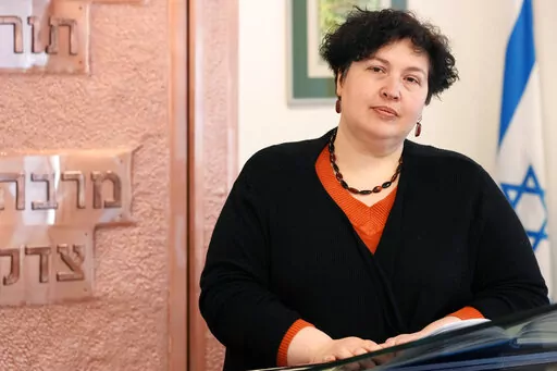 Rabbi Julia Gris, who led a Progressive Jewish congregation in Odessa, Ukraine, visits a synagogue in Warsaw, Poland, Saturday, March 12, 2022. Many Jews are among the more than 2.5 million refugees leaving Ukraine. International Jewish organizations have mobilized to help, working with local Jewish communities in Poland, Romania, Moldova and elsewhere to organize food, shelter, medical care and other assistance. Among them is Rabbi Gris, Ukraine's only woman rabbi, who these days leads online S