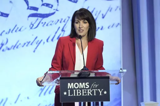 Moms for Liberty co-founders Tina Descovich, left, speaks at the Moms for Liberty meeting in Philadelphia, June 30, 2023. The co-founder of Moms for Liberty, a “parental rights” group that has sought to take over school boards in multiple states, was appointed Wednesday, Sept. 6, to the Florida Commission on Ethics. (AP Photo/Matt Rourke, File)