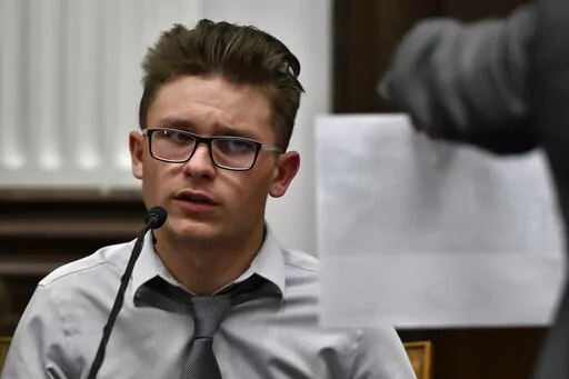 Dominick Black testifies during Kyle Rittenhouse's trial at the Kenosha County Courthouse in Kenosha, Wis, on Nov. 2, 2021. Black, who bought an AR-15-style rifle for Kyle Rittenhouse has pleaded no contest to a reduced charge of contributing to the delinquency of a minor in a deal with prosecutors to avoid prison. A Wisconsin judge accepted Dominick Black's plea on Monday, Jan. 10, 2022. (Sean Krajacic/The Kenosha News via AP, Pool File)