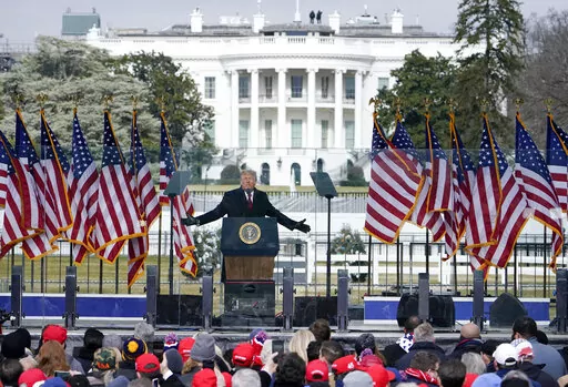 The White House in the background, President Donald Trump speaks at a rally in Washington, Jan. 6, 2021. The House committee investigating the U.S. Capitol insurrection is asking Ivanka Trump, daughter of former President Donald Trump, to voluntarily cooperate with its investigation.  (AP Photo/Jacquelyn Martin, File)