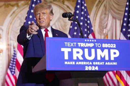 Former President Donald Trump gestures as he announces he is running for president for the third time as he speaks at Mar-a-Lago in Palm Beach, Nov. 15, 2022. Trump is facing a new legal threat, but there is little sign that the Republican Party is defending the former president with the same intensity and urgency that defined his previous legal clashes. (AP Photo/Andrew Harnik, File)