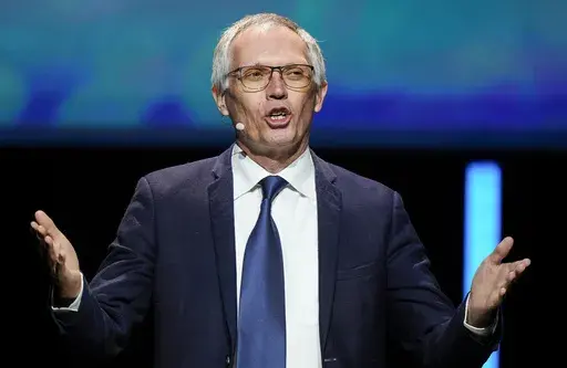 CEO Stellantis Carlos Tavares speaks during the Paris Automotive Summit on the sideline of the Paris Auto Show, in Paris, Oct. 15, 2024. (AP Photo/Michel Euler, file)